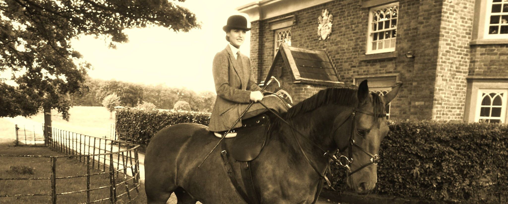 Hannah Henshall, Secret Agent riding side saddle at the Cheshire Forest Hunt meet from Peover Hall